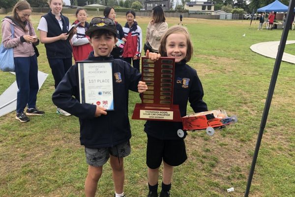 Two children with awards for the Tasmanian Model Solar Car Challenge